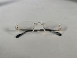 pair of glasses on a table with a white background