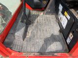 an image of a red truck with its door open