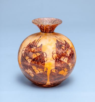 a vase with a design on it on a blue background