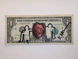 a dollar bill with a picture of an old man on it