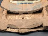 a wooden object that is sitting on a table