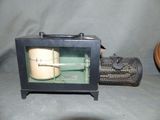 a small old fashioned radio sitting on a table