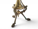 a brass table with a glass top on a white background