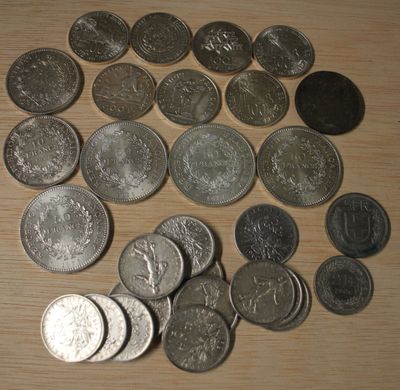Un lot de monnaies en argent (4 monnaies de 50 Francs, 2 mon…