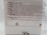 a close up of the back of a white box with a label on it