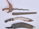 several different types of knives are displayed on a white surface