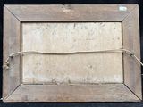 an old wooden picture frame with a rope hanging from it ' s side