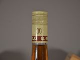 a bottle of wine that is sitting on a table