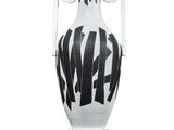 a white vase with a black and white design on it