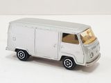 a toy van that is sitting on a white surface