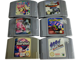 six cartouches de jeux Nintendo empilées les unes sur les autres