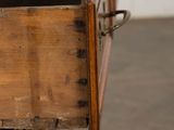 a close up of a wooden drawer with two drawers
