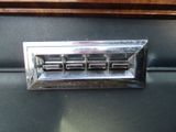 a close up of a metal door handle on a car