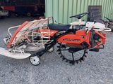 an image of a small tractor with a trailer attached to it ' s back
