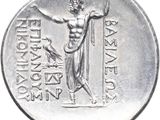 an image of a silver coin with a man holding a sword
