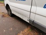 a van that is parked on the side of the road