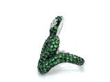 an image of a ring with green stones on a white background