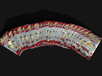 a lot of playing cards on a black background
