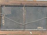 a picture of an old window with a broken glass