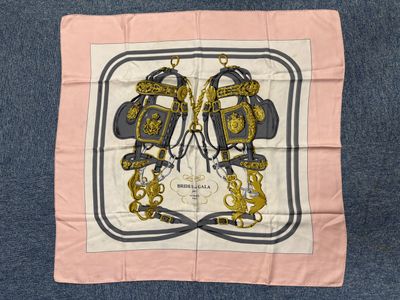 pink and black square scarf with a picture of a pair of boxing gloves on it