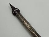 a pen that is sitting on top of a table