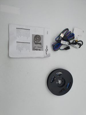 a picture of a remote control with wires attached to it