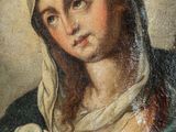 an old painting of a woman holding a baby in her arms