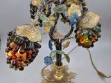 a lamp that has a bunch of beads on it