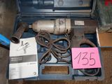 a box with a drill and other tools in it