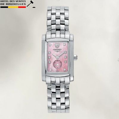 a watch with a pink dial on a silver bracelet
