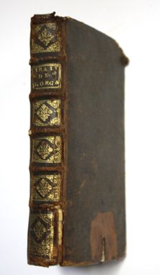 an old book that is sitting on a table