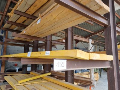 a large amount of wooden planks stacked on top of each other