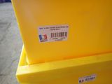 a yellow container with a barcode on it