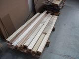many pieces of wood stacked on top of each other