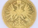 une image représentant une pièce d'or ornée d'un aigle à deux têtes