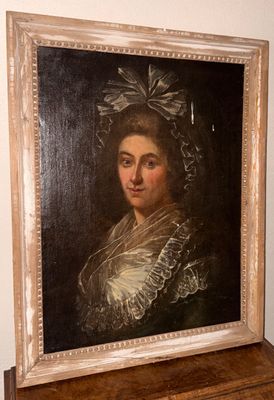 tableau représentant une femme en robe blanche avec un nœud sur la tête