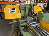a machine that is working on a piece of metal