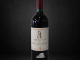 a bottle of wine that is sitting on a table