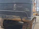 an image of a construction vehicle parked in a parking lot