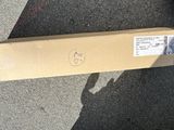 une boîte en carton sur laquelle est dessiné un smiley