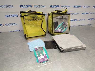 two bags of cleaning supplies sitting on a table