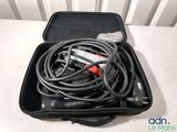 a black case with a bunch of wires in it