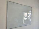 a picture of a mirror on the wall in a room