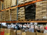 a large amount of boxes on the shelves in the warehouse