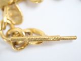 gold chain bracelet with a bar charm and a gold chain bracelet with a bar charm and a gold chain bracelet with a bar charm and a gold chain bracelet with a