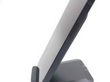 a cell phone that is sitting on top of a stand