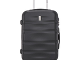 the black suitcase is on wheels and has a handle