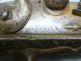 a close up of a metal object with a bird on it