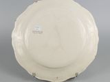 underside view of a plate showing the base of the bowl