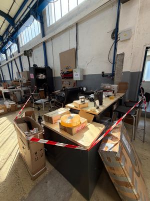 a large room with a lot of boxes and a table